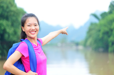 Wall Mural - woman tourist at yangshuo,guilin,china 