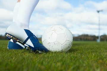 Poster - Football player about to kick ball