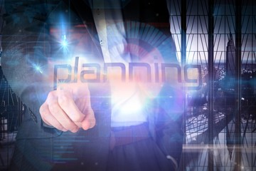 Aufkleber - Businessman presenting the word planning