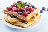 Fototapeta  - Homemade waffles with fruit