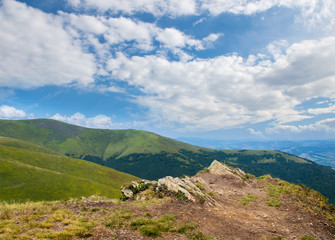 Wall Mural - Stones on a hillside with beautiful sky.