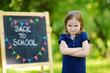 © MNStudio - Adorable girl being unhappy about going to school