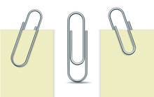 Metal Paperclip And Paper