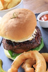 Sticker - gourmet burger with onion rings and fries