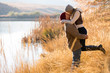 © michaeljung - young couple kissing in autumn