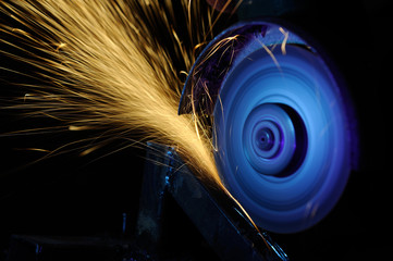 Wall Mural - Worker cutting metal with grinder