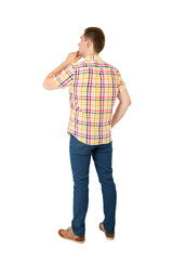 Back view of handsome man in yellow shirt