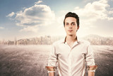 Fototapeta  - young man portrait in the city background