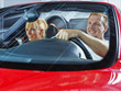 © Karin & Uwe Annas - Young couple has fun to drive a red roadster