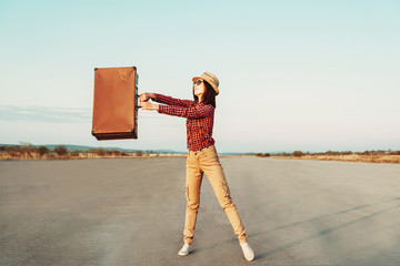 Poster - Happy traveler with suitcase