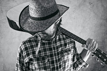 Western Country Cowboy Musician With Guitar