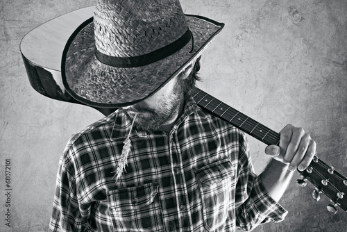 Obrazy Country & Western  muzyk-kowbojski-z-westernu-z-gitara