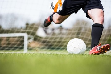 Poster - Goalkeeper kicking ball away from goal