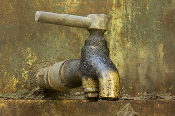 Stopcock of old rusty tank