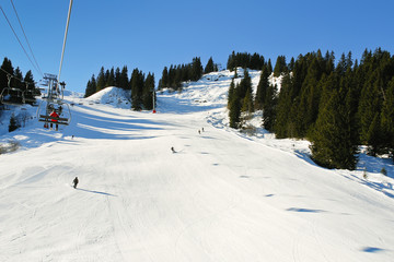 Poster - ski lift and skiing tracks on snow Alps mountains