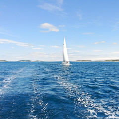 Wall Mural - white sail yacht in blue Adriatic sea