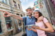 © Production Perig - Young couple of tourists visiting city