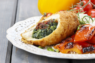 Wall Mural - Chicken roll stuffed with spinach and dried tomatoes