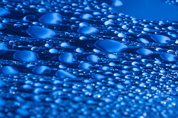 Wall Mural - blue water background with drops