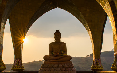 Buddha in sun set time