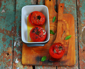 Canvas Print - the baked tomatoes stuffed with a cod on