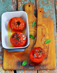 Canvas Print - the baked tomatoes stuffed with a cod on