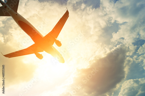 Fotografía Toned photo of commercial airplane in the sun