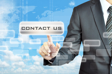 Businessman hand  touching CONTACT US sign on virtual screen