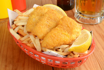 Canvas Print - Fish and fries on newspaper