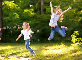 Portrait of two girls in the woods girlfriends