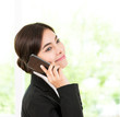 © siraphol - Business woman talking cellphone