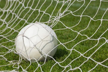 Poster - Football at the back of the net