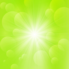 Wall Mural - Shiny Sun on green background