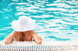 © milanmarkovic78 - Beautiful woman in the pool