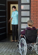 Elderly disabled woman enters the house