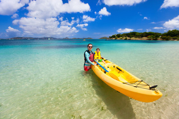 Canvas Print - Family kayaking at tropical ocean