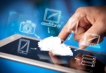 Finger pointing on tablet pc, mobile cloud concept