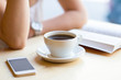 © kjekol - Girl reading book and drinking coffee at cafe