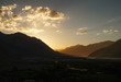 Sunset over Himalayas mountains in Nubra valley near  Diskit Gom