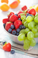 Wall Mural - fresh fruits and berries. strawberry blueberry grape apricot