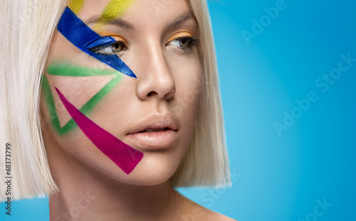 Obraz w ramie beautiful woman with color stylish make up