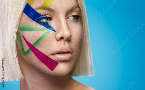 Fototapeta do kuchni beautiful woman with color stylish make up