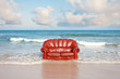 red vintage sofa in the sea