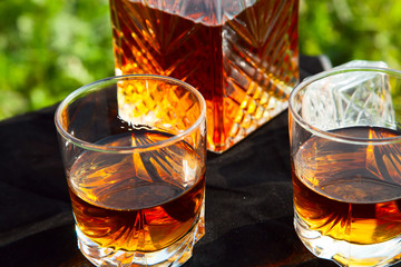 Decanter with two glasses of whiskey