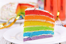 Delicious Rainbow Cake On Plate On Table Close-up