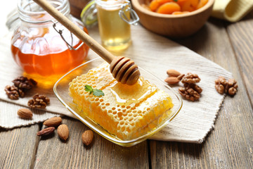 Wall Mural - Fresh honey on wooden table