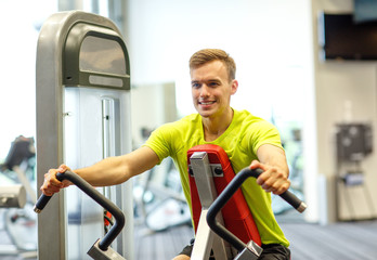 Sticker - smiling man exercising in gym