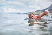 Senior Man Swimming In The Sea/Ocean