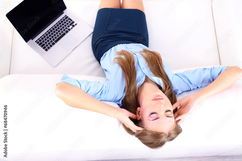 Business woman with laptop working at home