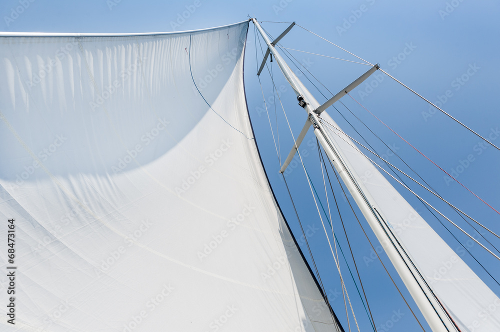 Big white sail hoisted - obrazy, fototapety, plakaty 
